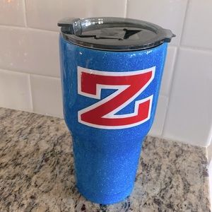 “Z” insulated tumbler in sparkly blue with a red and white Z